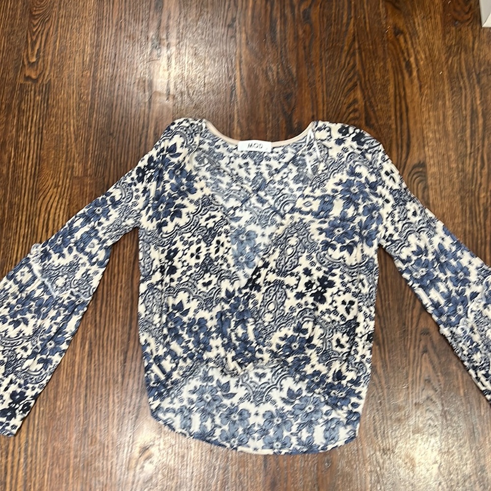 Boutique top with bell sleeves